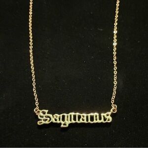 Gold plated Sagittarius nameplate necklace. Brand new, in perfect condition